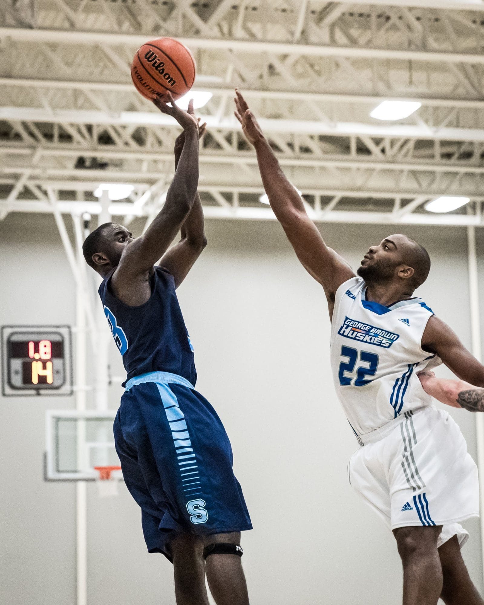 TORONTO, ON – Mar. 4, 2017: Brian Owusu releases the championship-winning shot for the Sheridan Bruins.